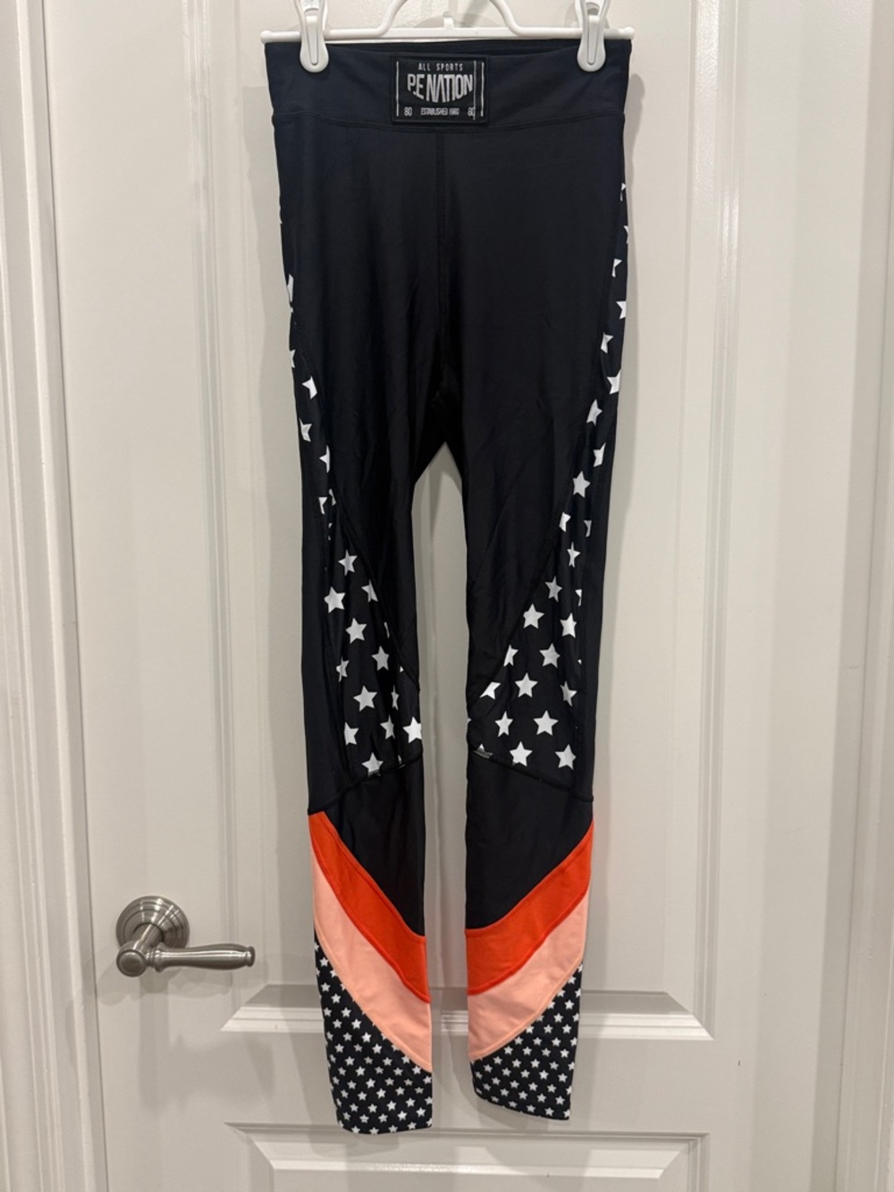 P.E NATION Black Leggings with White Stars and Coral & Peach Panels
